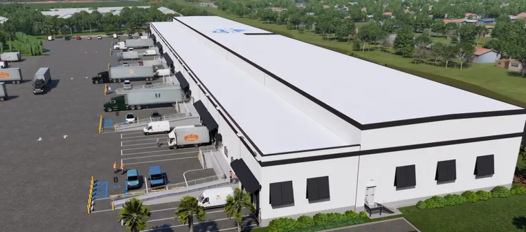 Aerial view of the Lake Worth, Florida facility: the full building end-on with the truck court.